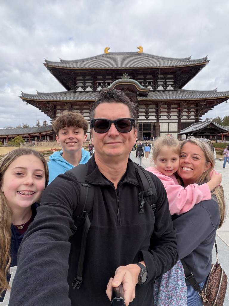 Full Nickolaou family selfie in front of the massive Todai-ji hall