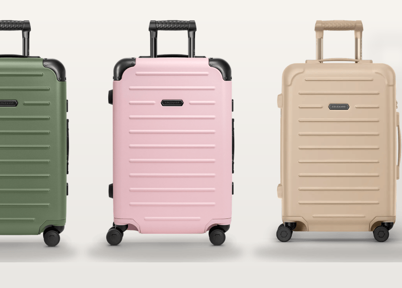 The Nickolaou family's five Solgaard carry-on closets: black, sage green, pink, beige, and blue